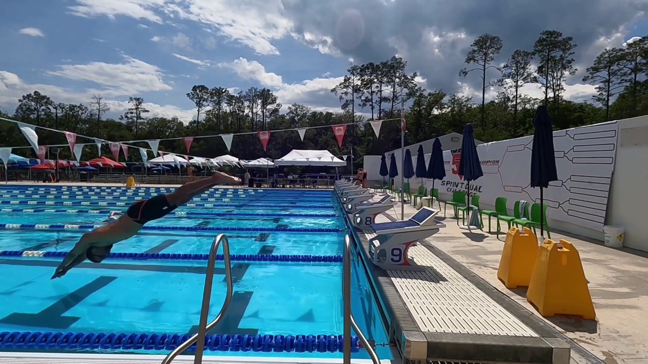 CONTROL source frame at 5.333 seconds in the forward swimming start.